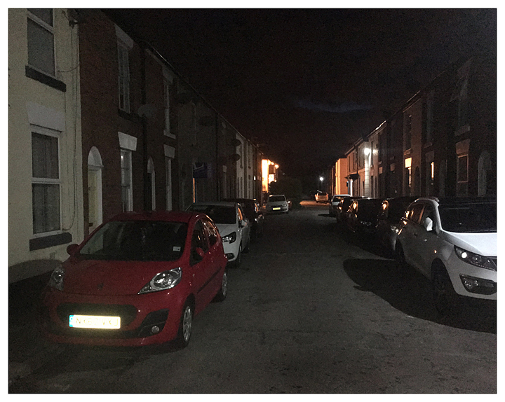 Pub lights at night in Walter Street