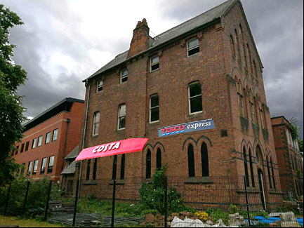 costa and tesco signs on dee house